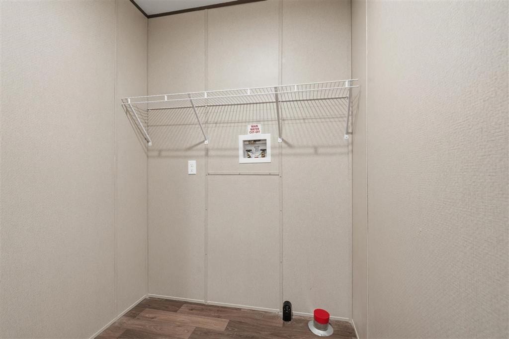 Utility room with wire shelving and washer and dryer hookups
